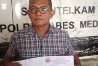 Nico Nadeak Ketua JPKP Sumut saat memasukkan surat Pemberitahuan Aksi Demo di Polrestabes Medan (Dok - Photo)