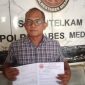 Nico Nadeak Ketua JPKP Sumut saat memasukkan surat Pemberitahuan Aksi Demo di Polrestabes Medan (Dok - Photo)