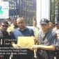 Afandi Komisi 4 DPRD Kota Medan menerima peserta massa Aksi (Dok-Foto)