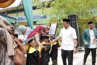 Wali Kota Tanjungbalai Hadiri Peringatan Hardiknas, Wisuda Khatam Al Qur’an Ke-XVI dan Perpisahan Santriwan/Santriwati Madrasah Alwashliyah Gading. (Dok-Foto) 