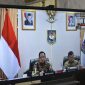 Bupati Tapanuli Tengah (Tapteng) Masinton Pasaribu, SH, MH, pada Kamis 21 Mei 2026, mengikuti rapat koordinasi secara daring melalui Zoom Meeting (Dok-Poto)