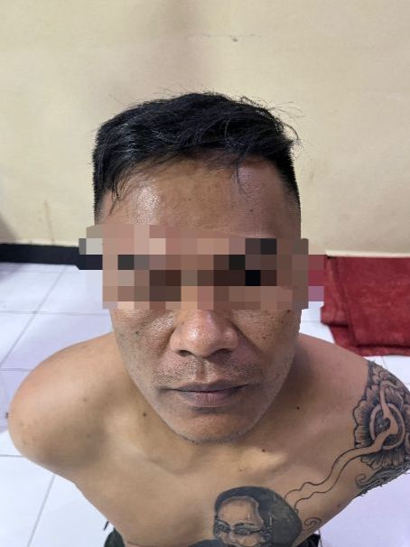 Terduga pelaku, ( Dok - Foto ).