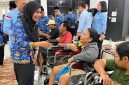 Pemko Tanjungbalai Serahkan 20 Alat Bantu Bagi Penyandang Disabilitas dan 90 Seragam Sekolah. (Dok-Foto)