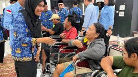 Pemko Tanjungbalai Serahkan 20 Alat Bantu Bagi Penyandang Disabilitas dan 90 Seragam Sekolah. (Dok-Foto)