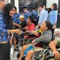 Pemko Tanjungbalai Serahkan 20 Alat Bantu Bagi Penyandang Disabilitas dan 90 Seragam Sekolah. (Dok-Foto)