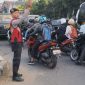 Polda Jabar menggelar aksi serentak Pergelaran Personel Pengaturan Lalu Lintas di berbagai titik rawan kemacetan,( Dok - Foto )