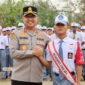 Kapolres Kebumen AKBP Rachmad C. Yusuf menjadi inspektur upacara dalam upacara bendera di SMK Negeri 2 Kebumen,( Dok - Foto )